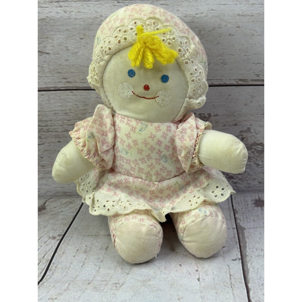 EDEN Plush Baby Doll Rattle Stuffed Toy Lovey Floral Dress Yellow Yarn Hair
